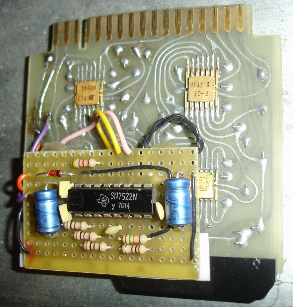 Photo of CC-032 μPAC showing added board with SN7522N chip.